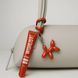 Бальзам-блиск для губ Velvet coral WISHLIST Lip gloss balm, 10мл + іграшка-брелок 395-c25 фото 1